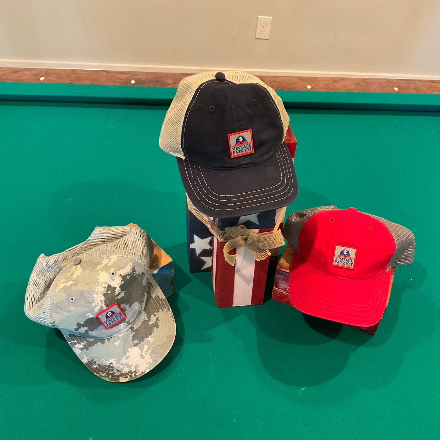 Unstructured Trucker Hat with a Rubber Vintage Patriot House Logo Patch