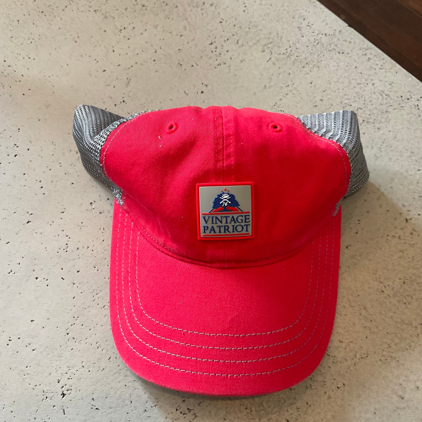 Unstructured Trucker Hat with a Rubber Vintage Patriot House Logo Patch