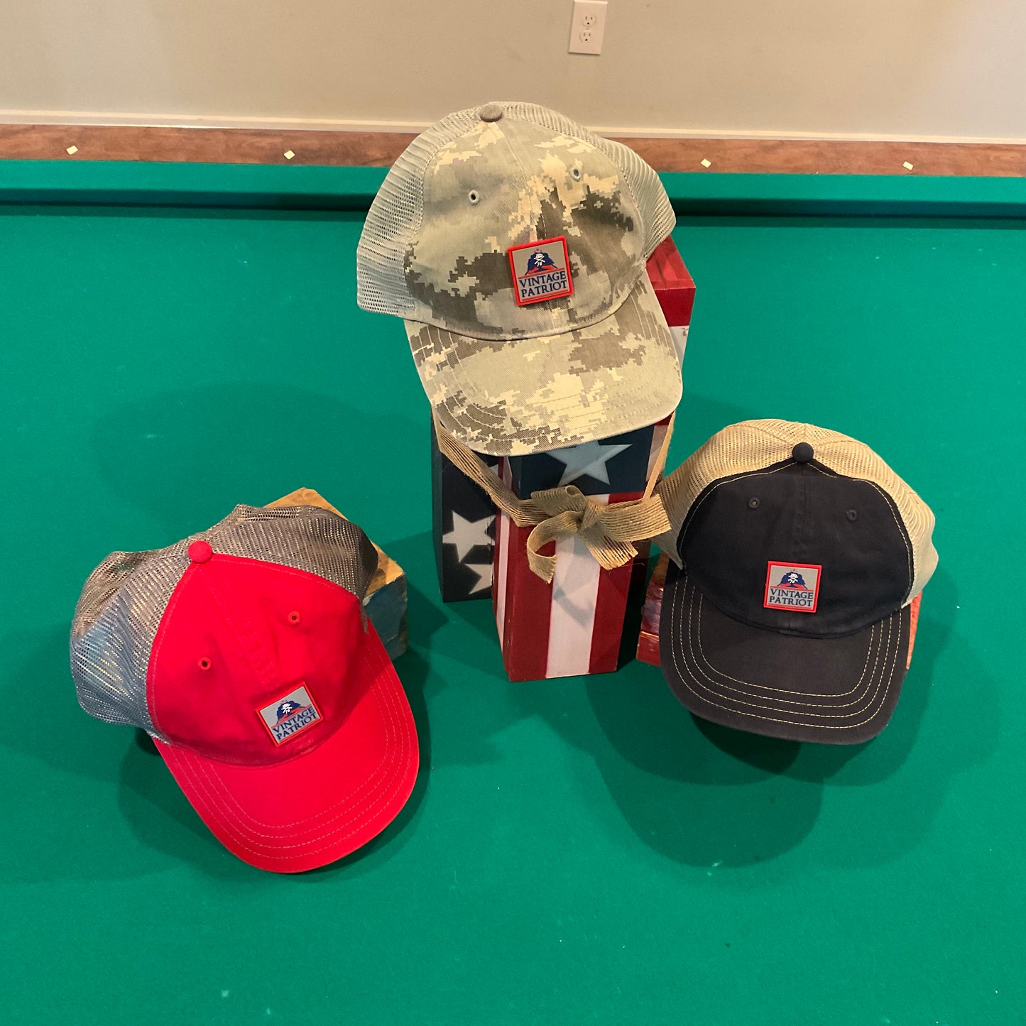Unstructured Trucker Hat with a Rubber Vintage Patriot House Logo Patch