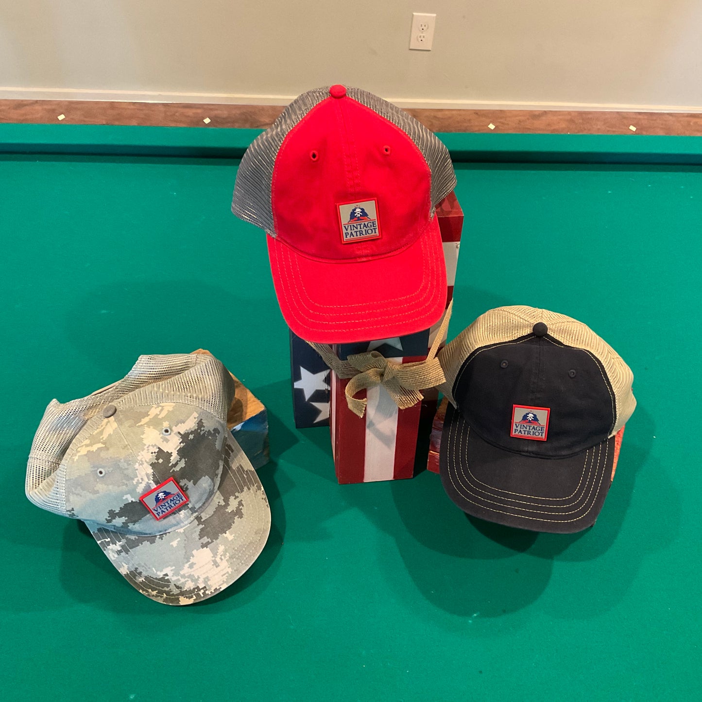 Unstructured Trucker Hat with a Rubber Vintage Patriot House Logo Patch